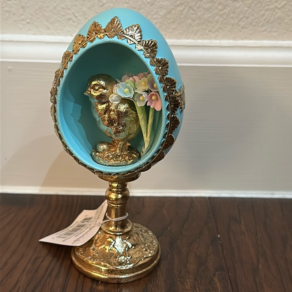7” teal egg from the December Diamonds confectionary collection.  Ornate detail.